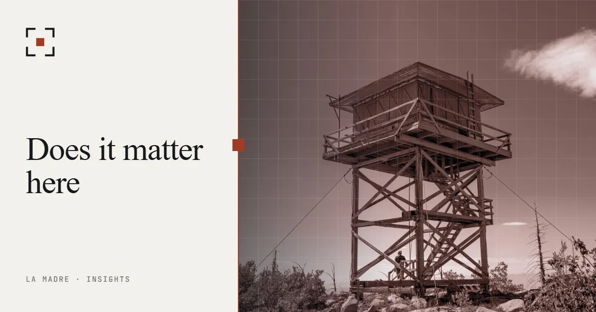 A fire lookout tower on a mountain ridge under a blue sky, in La Madre duotone, beside the words Does it matter here