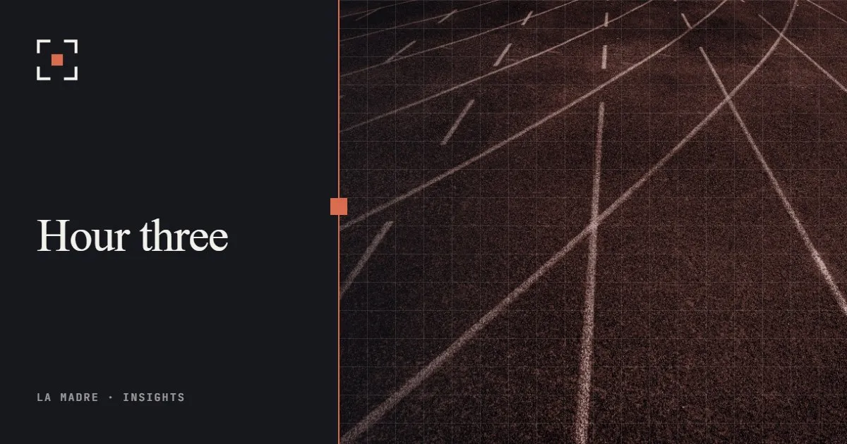 Curving lanes of a running track, in La Madre duotone, beside the words Hour three