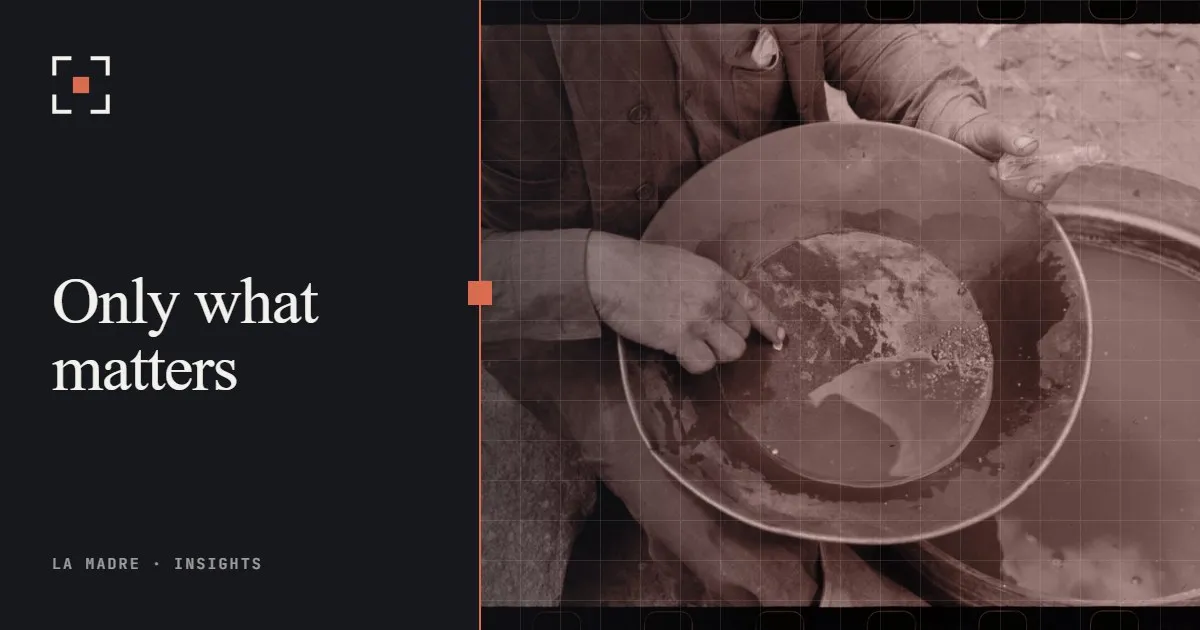 Hands panning for gold in a shallow metal pan, in La Madre duotone, beside the words Only what matters