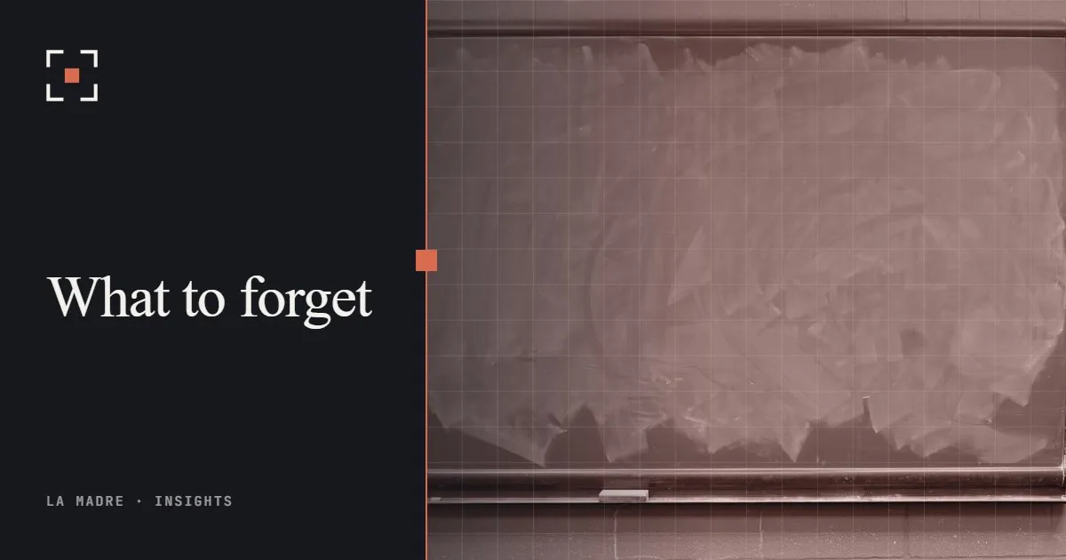 A green chalkboard covered in smudges from erased writing, in La Madre duotone, beside the words What to forget