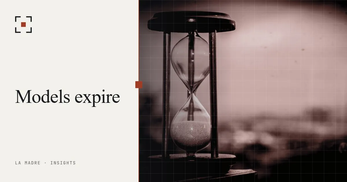 An hourglass in black and white with the sand running out, in La Madre duotone, beside the words Models expire