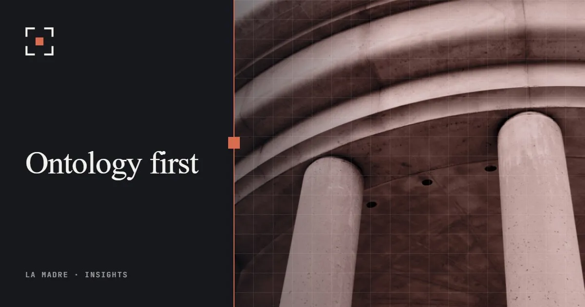 The curved colonnade of a classical stone building, in La Madre duotone, beside the words Ontology first