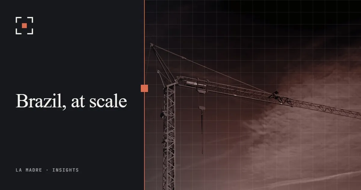 A red tower crane against a deep blue sky, in La Madre duotone, beside the words Brazil, at scale