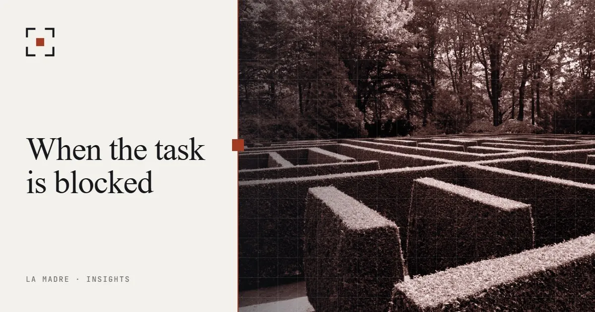 A hedge maze seen from above its walls, in La Madre duotone, beside the words When the task is blocked