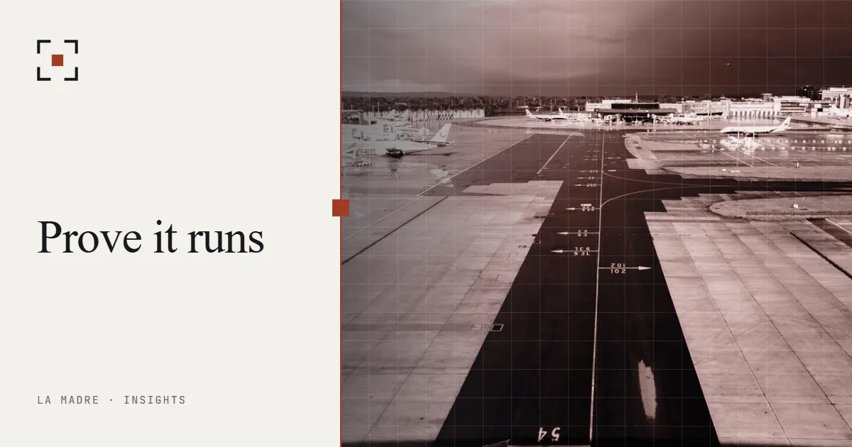 An airport taxiway with painted guide lines leading toward the runway under a dark sky, in La Madre duotone, beside the words Prove it runs