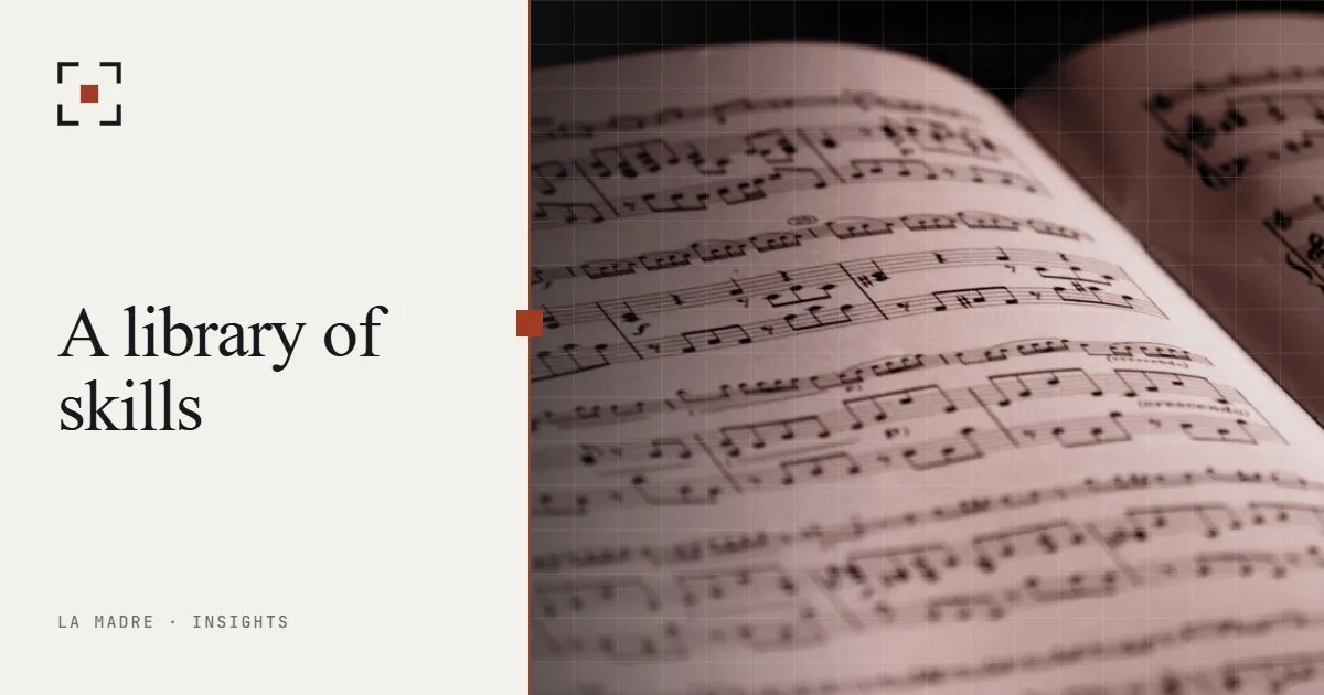 An open book of sheet music, in La Madre duotone, beside the words A library of skills