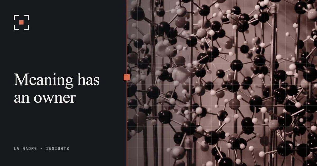 A large ball-and-stick molecular model in a museum, in La Madre duotone, beside the words Meaning has an owner
